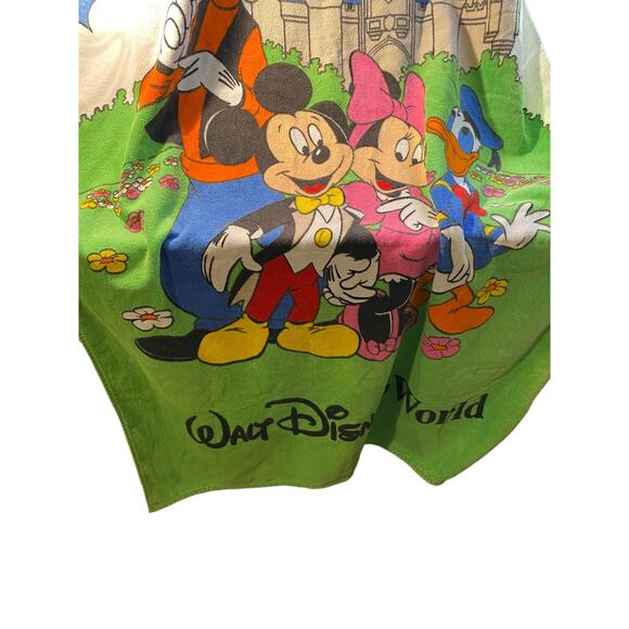 Beach towels it is a big and it a Disney towel has several characters on it - Picture 4 of 4